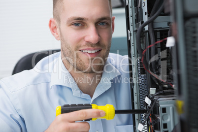 Young computer engineer working on cpu