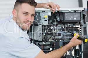 Portrait of computer engineer working on cpu