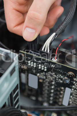 Hand fixing motherboard