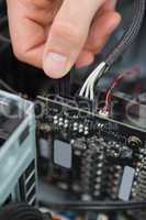 Hand fixing motherboard