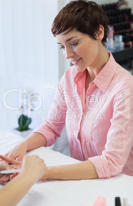 Woman getting a manicure