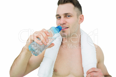 Portrait of man drinking water with towel around neck Portrait of man drinking water with towel around neck