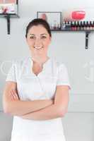 Portrait of confident young woman at nail salon