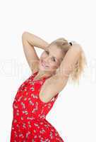 Portrait of young woman in red summer dress