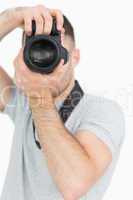 Close-up of photographer with photographic camera