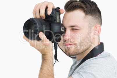 Close-up of photographer with photographic camera