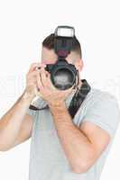 Male photographer with photographic camera