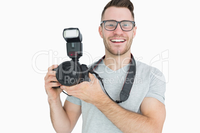 Portrait of photographer with photographic camera