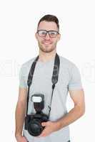 Portrait of photographer with photographic camera