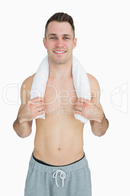 Portrait of man holding towel around neck