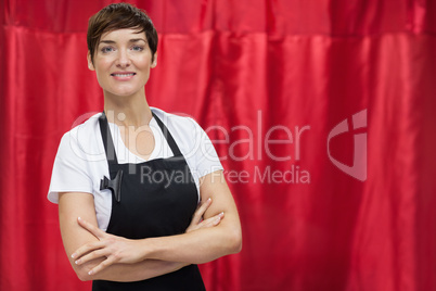 Portrait of a hairdresser with arms crossed