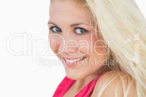 Close-up of beautiful young woman with blue eyes and blonde hair