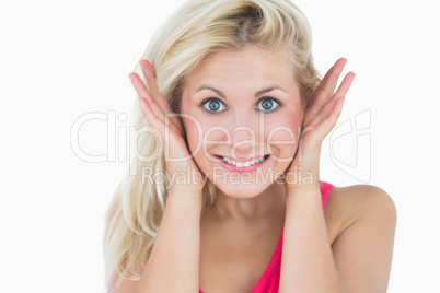 Close-up of happy surprised young woman