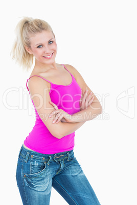 Portrait of happy casual woman with arms crossed