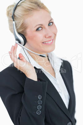 Portrait of young business woman wearing headset