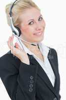 Portrait of young business woman wearing headset