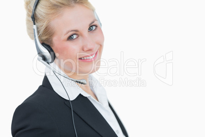 Close-up portrait of young business woman wearing headset