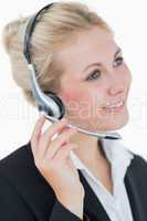 Close-up portrait of young business woman wearing headset