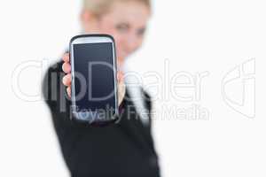 Young business woman showing her new smartphone