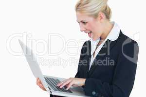 Young business woman using laptop