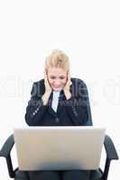 Successful young business woman with laptop