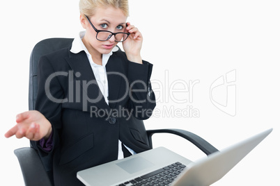 Portrait of young businesswoman with laptop