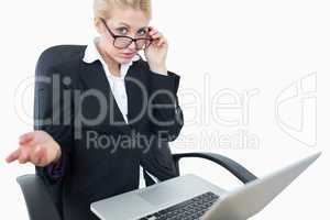 Portrait of young businesswoman with laptop