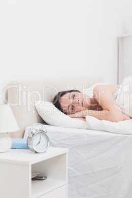 Beautiful woman sleeping in bed