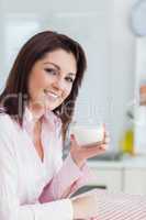 Young woman with glass of milk