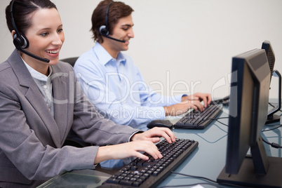 Happy call center employees at work