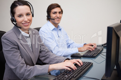 Happy call center employees at work