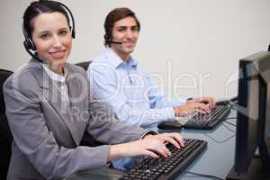 Happy call center employees at work