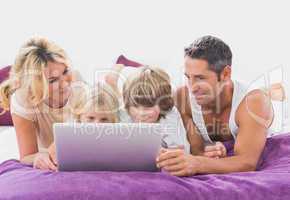 Family using together a laptop