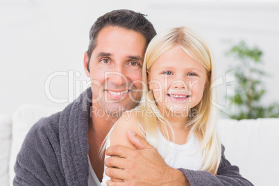 Father hugging his daughter