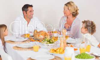 Family talking together before to eat