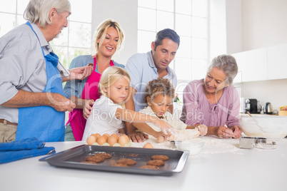 Family preparing biscuits together