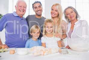 Family posing in the kitchen