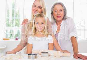 Mothers and daughters cooking together