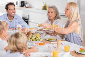 Mother serving vegetables