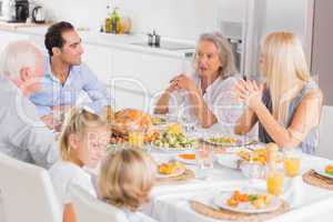 Family enjoying the thanksgiving dinner