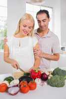 Happy couple preparing the dinner