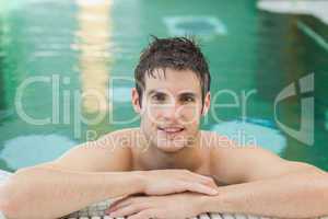 Smiling man in a swimming pool