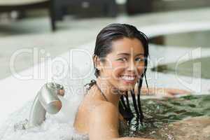 Woman smiling in hydrotherapy pool