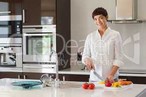 Girl cutting vegetables