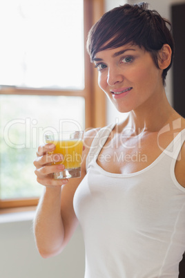 Woman drinking orange juice