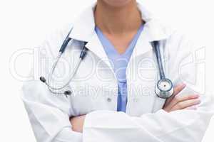Female doctor in lab coat wearing stethoscope around neck