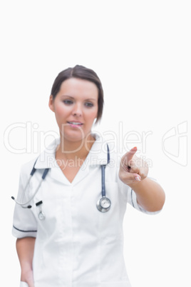 Nurse pointing at invisible screen