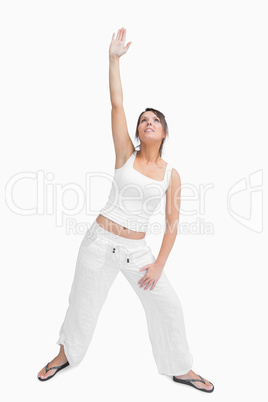 Young woman performing stretching exercise