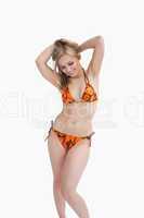 Young happy woman posing in bikini