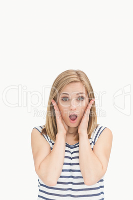 Portrait of surprised casual young woman